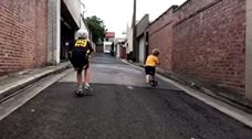 Kids playing with scooter in Sydney, shared by Nicholas James Cole.